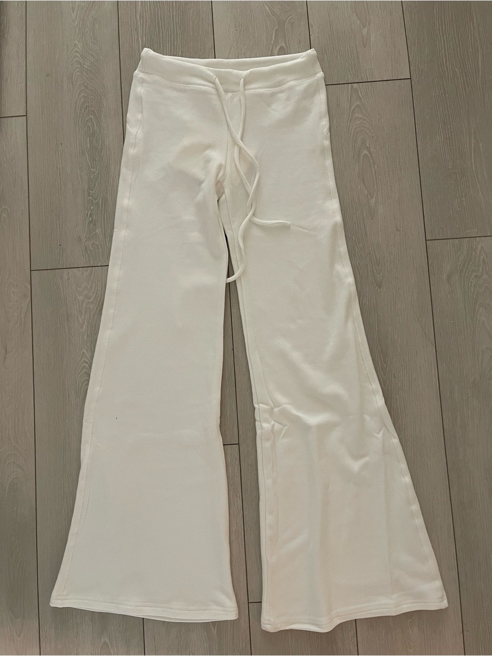 White flare pants